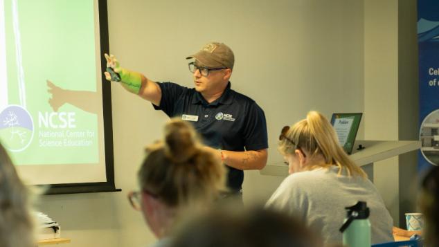 NCSE's Blake Touchet leads a professional learning event for teachers.