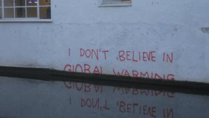"I don't believe in global warming" graffiti