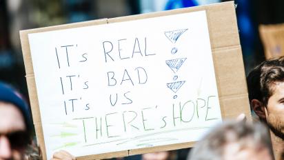 Climate change protest sign.