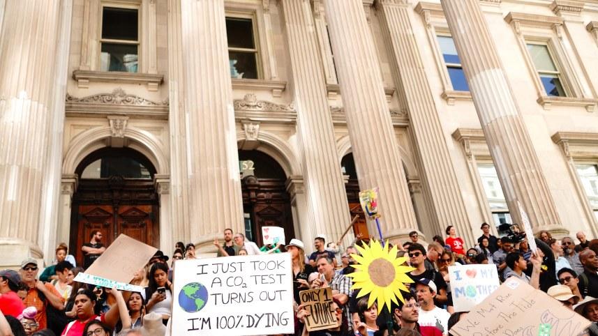 Protestors outside a statehouse.